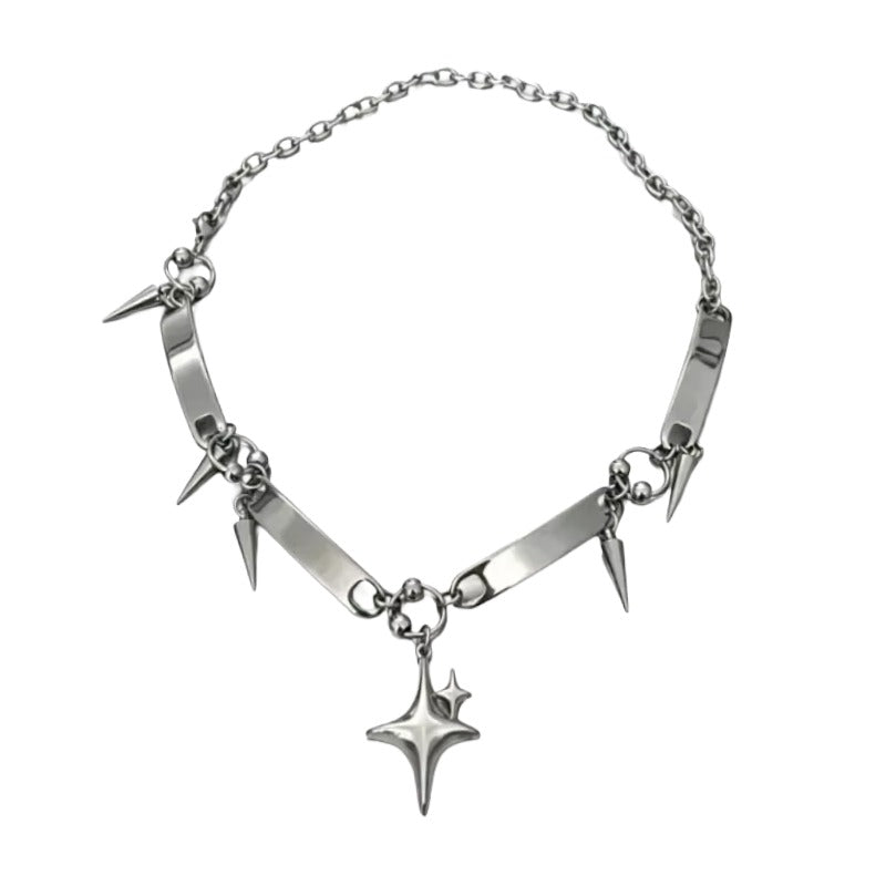 Silver Star Choker Necklace – Y2K Aesthetic Jewelry. A silver-toned metal chain necklace featuring multiple sharp spikes, polished bar charms, and a dangling starburst pendant.