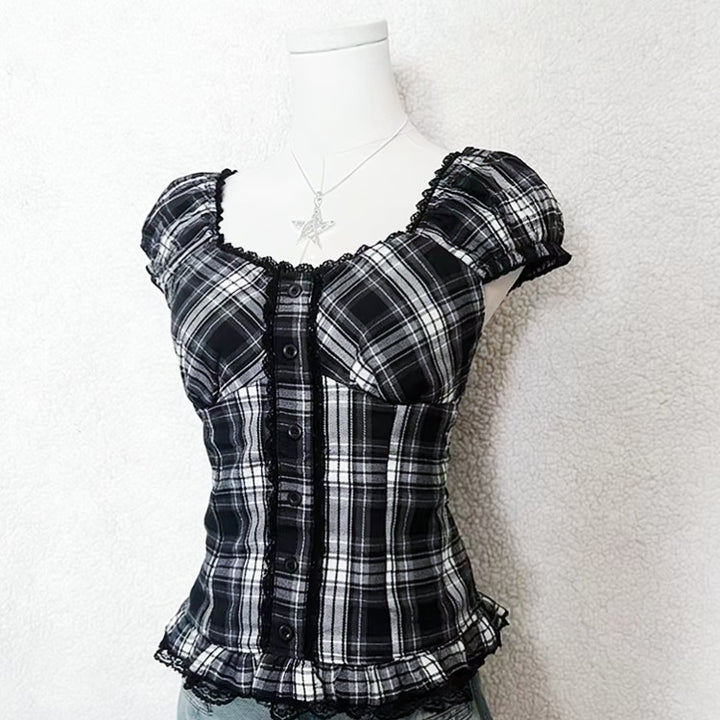 A black, white, and gray plaid corset-style blouse with puff sleeves, a button-front center, and black lace trim, Black White Plaid Corset Top - Ruffle Sleeve Gothic Blouse