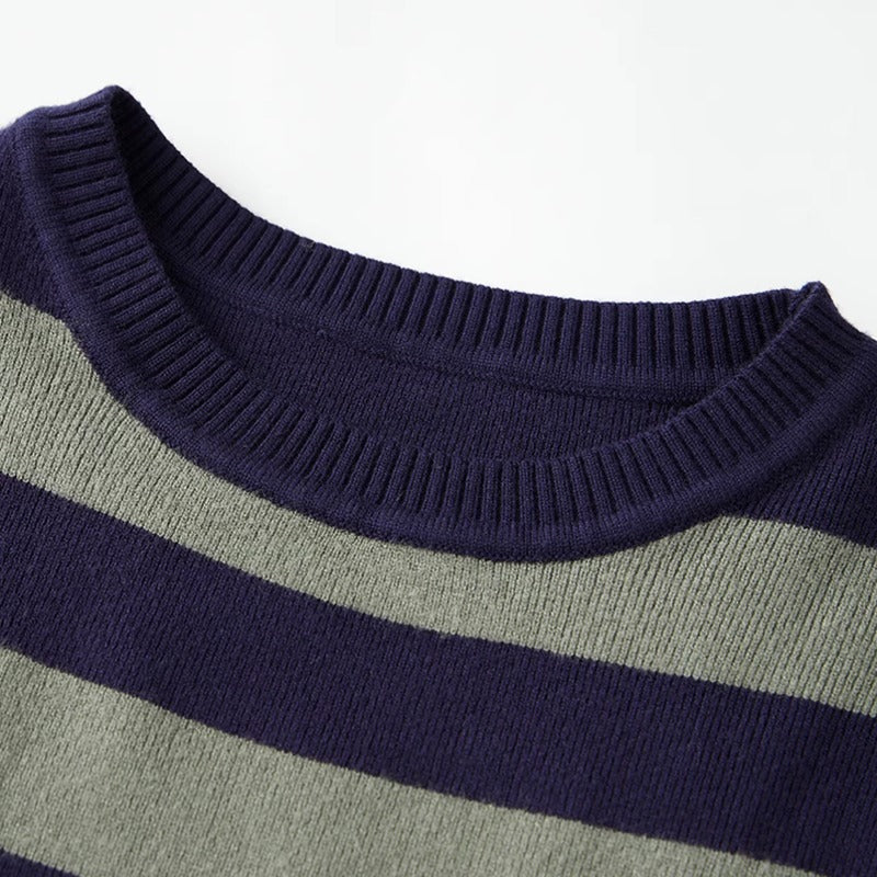 Striped Cropped Knit Sweater – Indie Aesthetic Pullover. Close-up of a striped knit sweater showing a dark navy ribbed crew neck and horizontal navy and light gray stripes.